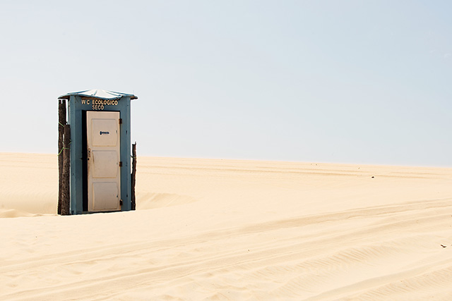 An isolated toilet in the Lencois Maranhensis sand dunes of Brazil.